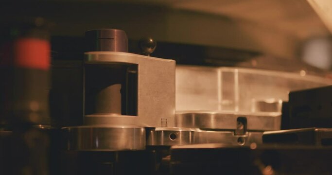 Internal mechanisms in a cinema projector in a movie theatre