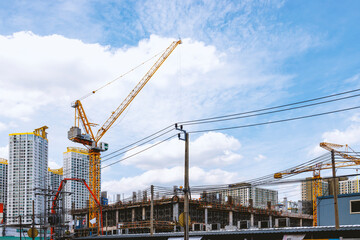  workers are working on large construction sites and many cranes are working in the, Industry new...