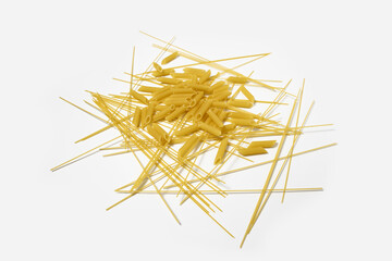 Dry pasta long spaghetti on a white background. Top view, flat lay. Banner.