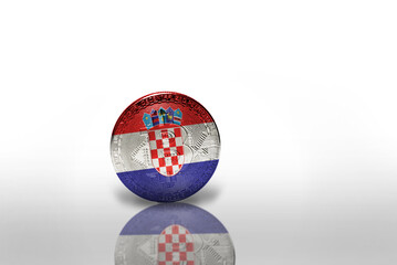 Naklejka premium bitcoin with the national flag of croatia on the white background. bitcoin mining concept.