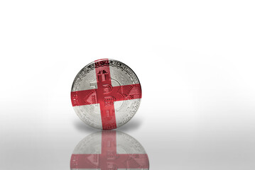 Naklejka premium bitcoin with the national flag of england on the white background. bitcoin mining concept.