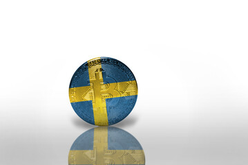 bitcoin with the national flag of sweden on the white background. bitcoin mining concept.