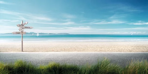 Fototapeten beautiful beach road intentionally blurs the grass in front © Nitinan