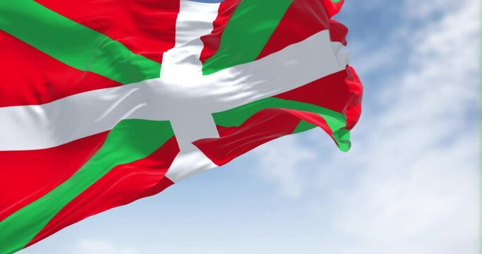 The Basque Country flag waving in the wind on a clear day