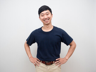 Asian man happiness emotion hand waist smiling isolated