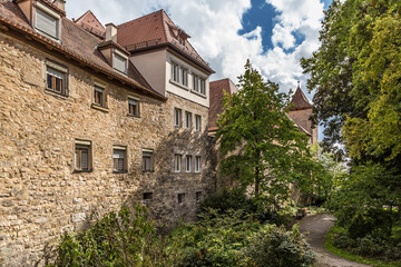 Fototapeta na wymiar Rothenburg ob der Tauber, Germany. The fortress wall, rebuilt into a residential building