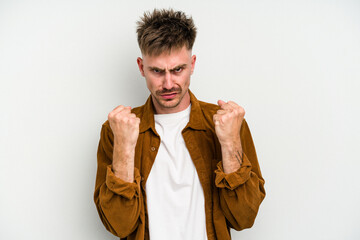 Young caucasian man isolated on white background upset screaming with tense hands.