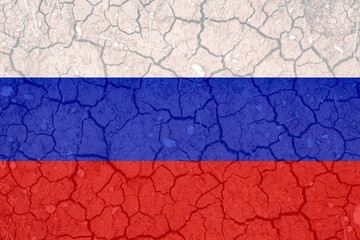 Flag of Russia on the cracked ground textured