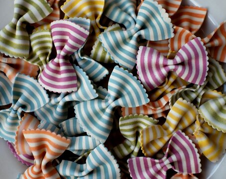 close up of coloured bow pasta in a bowl