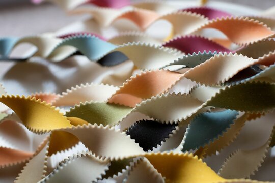 up close colourful long twirling spaghetti pasta textures