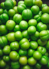 Tkemali, green cherry plum, top view, close-up, food background, no people, selective focus,