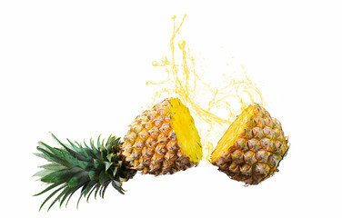 Pineapple, cut in half in mid-air, with water or splash. Ripe fruit is not peeled. on a white...