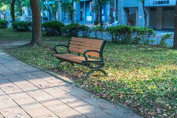 Park, a chair in the park, relaxing, Banyan trees on Dunhua Road, Taipei. feeling calm