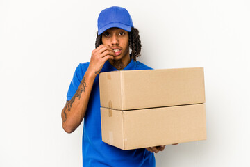 Young African American delivery man isolated on white background biting fingernails, nervous and very anxious.