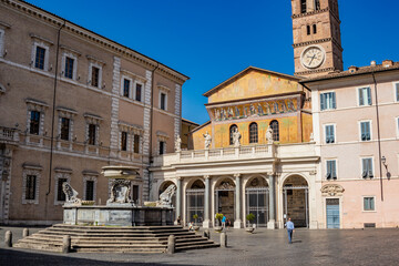 The basilica of Santa Maria in Trastevere, in a square of the  center of Rome. The facade with the...