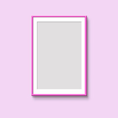 Bright pink frame with white  pas partu on a light pink wall. Vertical mock up for a poster. Picture frame on a wall. - 510664295