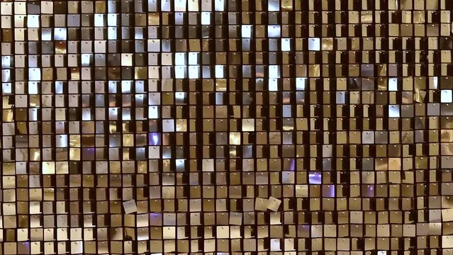 Beautiful abstract sparkles glitter background. Glittering sequins on the wall.