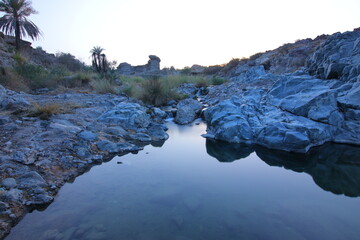 the place is beautiful , with mountains, rocks , small fish
