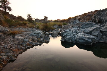 the place is beautiful , with mountains, rocks , small fish