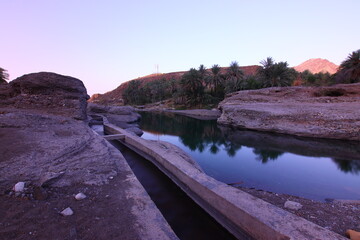 the place is beautiful , with mountains, rocks , small fish
