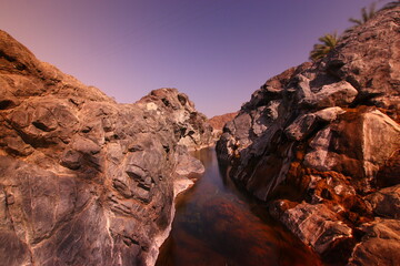the place is beautiful , with mountains, rocks , small fish
