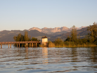 The historical (wooden bridge) holzbrücke and the 16th century bridge chapel (Helig Hüsli), Rapperswil, St. Gallen Switzerland