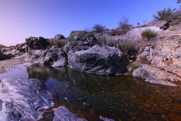 the place is beautiful , with mountains, rocks , small fish