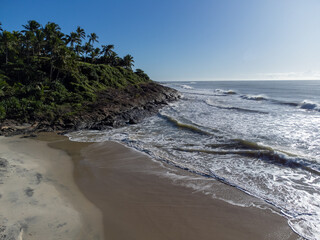Aerial view of a deserted paradise beach amidst the nature of the Atlantic Forest