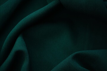 Delicate dark green thin fabric, emerald material chiffon