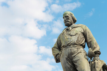 Fototapeta na wymiar Bronze monument of the Italian general Giuseppe Garibaldi in the city of Pisa - Tuscany - Italy