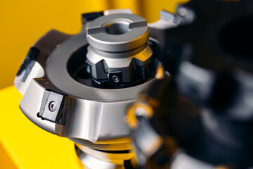 Closeup macro photo drill bit for CNC machine cutting sheet metal