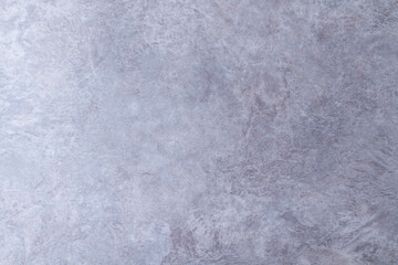 The texture of the stone wall.Small cracks on the concrete wall.