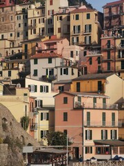 Fototapeta na wymiar Manarola, Cinque Terre National Park, Liguria, Italy Town of Manarola, Liguria, Italy.View of the colorful houses along the coastline of Cinque Terre area. Liguria, Italy.