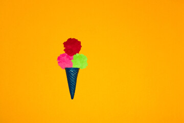 blue ice cream cone with three balls of paper ice cream, creative art summer design, yellow...