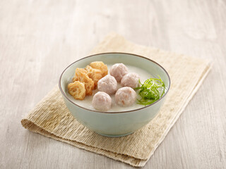 Handmade Meatball Congee served in a dish isolated on mat side view on grey background