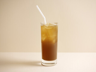 A glass of fresh iced chestnut water with straw isolated on grey background side view