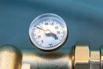 Round thermometer for measuring water temperature in the heat supply system
