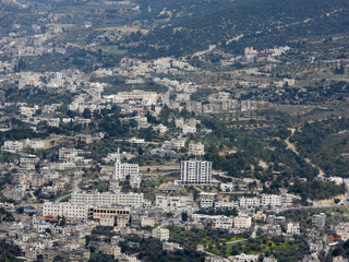 Fototapeta na wymiar Ajloun, Jordan buildings, mosques and trees 