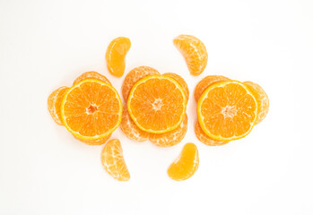 selective focus Tangerine or komola in a plate isolated on white background, top view