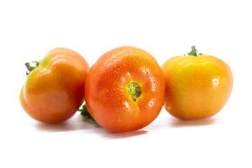 fresh tomatoes isolated on white background