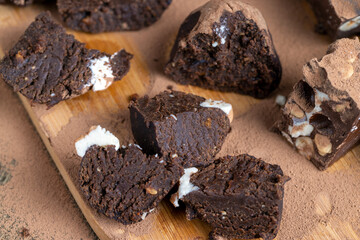 potato cake with cocoa cut into a large number of pieces