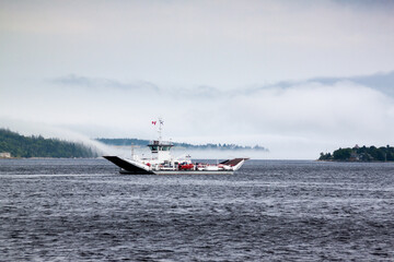 Small ferry on a foggy day in Lunenburg County, Nova Scotia, Canada.
