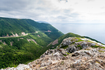 Fototapeta na wymiar The world-famous views of Cabot Trail winding along the Cape Breton shoreline.