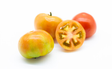 fresh organic tomatoes isolated on white background