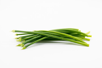 chives or garlic chives isolated on white .