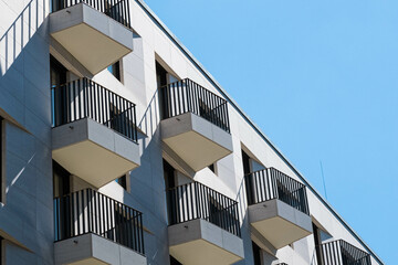 balconies on apartment building facade, residential real estate