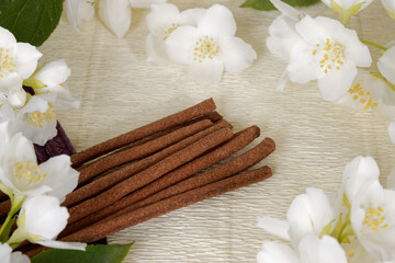Handmade luxury incense sticks with white jasmine flowers.