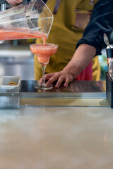 barman preparing a delicious margarita cocktail