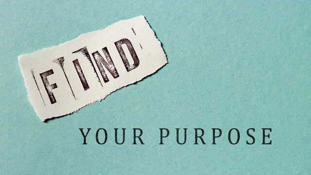 Find your purpose words on paper. Stamp font. Meaningful life concept.