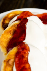 cottage cheese cheese cakes are eaten with sour cream or jam